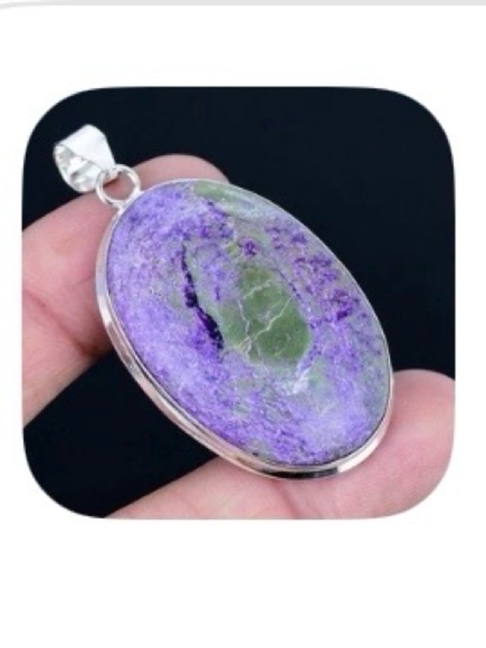 Pretty, 2 1/4 inch, natural Purpurite pendant on a silver chain.